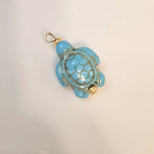 Tortuga turquesa y dorada Charm
